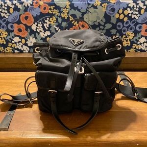 Prada backpack pre loved condition clean inside and out excellent. AUTHENTIC